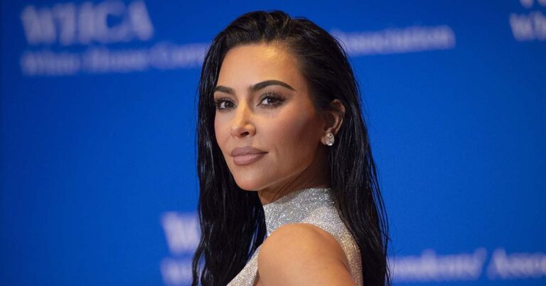 Kim Kardashian Rocks ’90s Updo and Camo Mini Dress: Photo